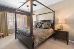 The ground floor master bedroom features a king bed and en-suite bathroom